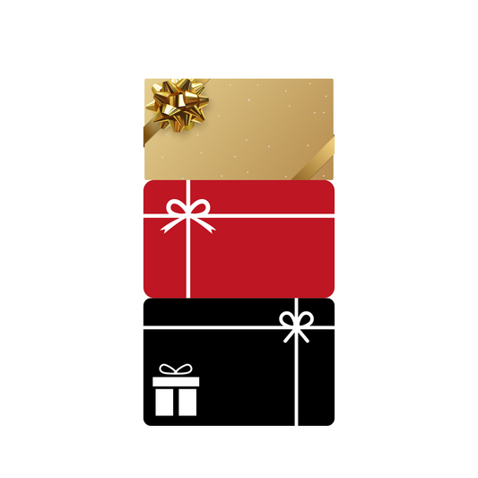 Stack of gift boxes in gold, red, and black with white bows on a white background